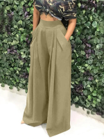 Vrouwen met eenvoudige wijde pijpen broek met zakken en hoge elastische tailleband in effen kleur