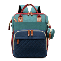 TravelNest – Altijd een Rustplek – 2 in 1 Luiertas met Babybed Blauw en groen | Educatief Speelgoed