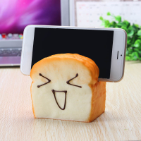 Jumbo Squishy 7 Seconds Slow Raising Slice Toast Joy Happy Faces Mobile Phone Seat Cell Phone Holder
