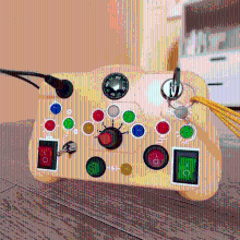 Mijn Hummeltje Busy Light Board™    Licht, Geluid & Plezier   Activiteiten bord Geel | Educatief Speelgoed