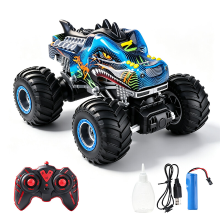 UINLE Baby Dinosaurus RC Monster Truck Speelgoed, 2,4 GHz Afstandsbediening Big Foot Stuntauto met Sproeifunctie, 360° Rotatie, 3 Modus LED Verlichting & Muziek, Rubberen Banden, All Terrain Off Road Voertuig, Speelgoed Cadeau voor Jongens Kinderen